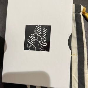 Earrings retails $125